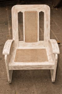 Old wooden caned chair 