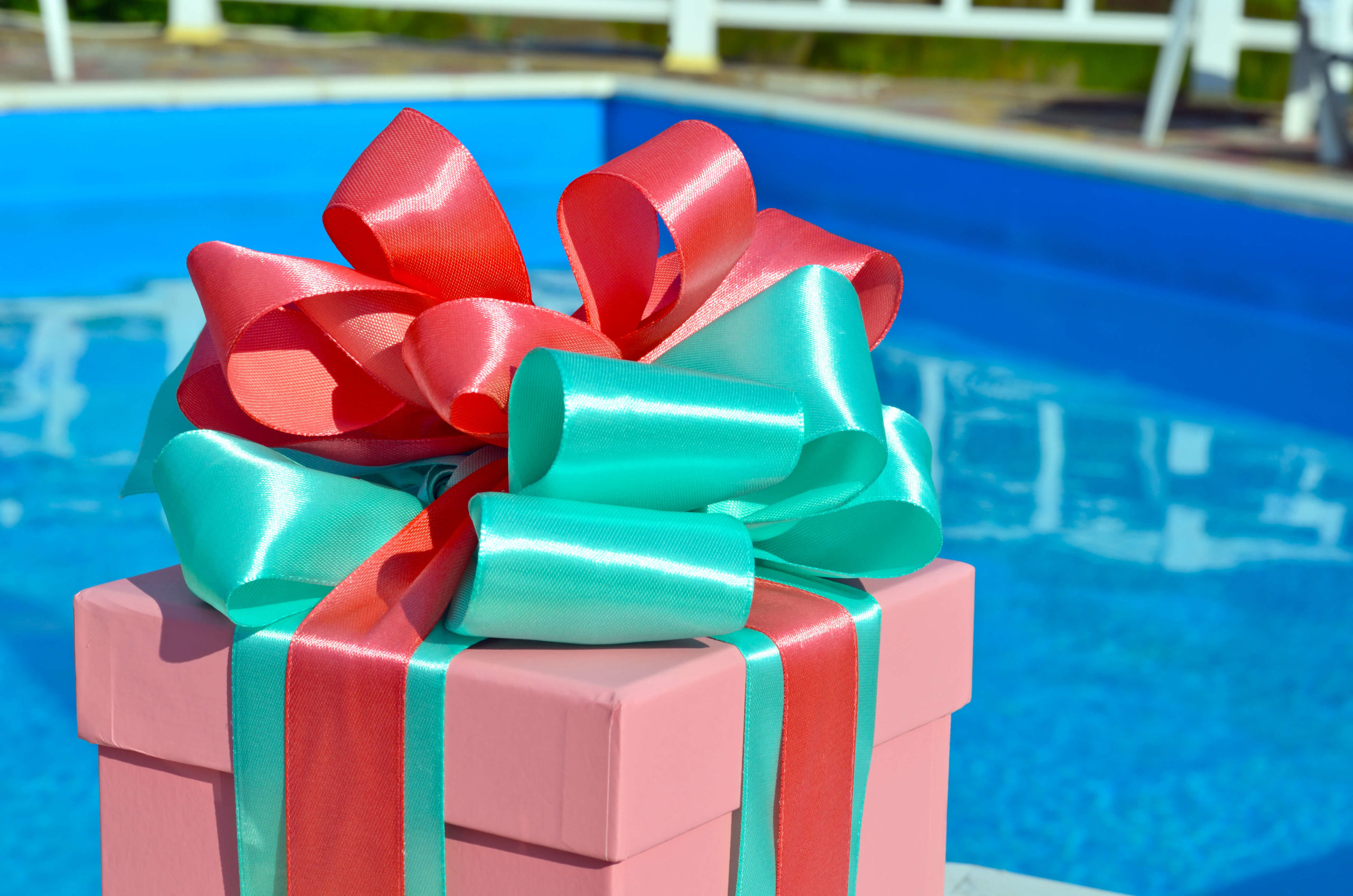 Wrapped Christmas Gift by Pool