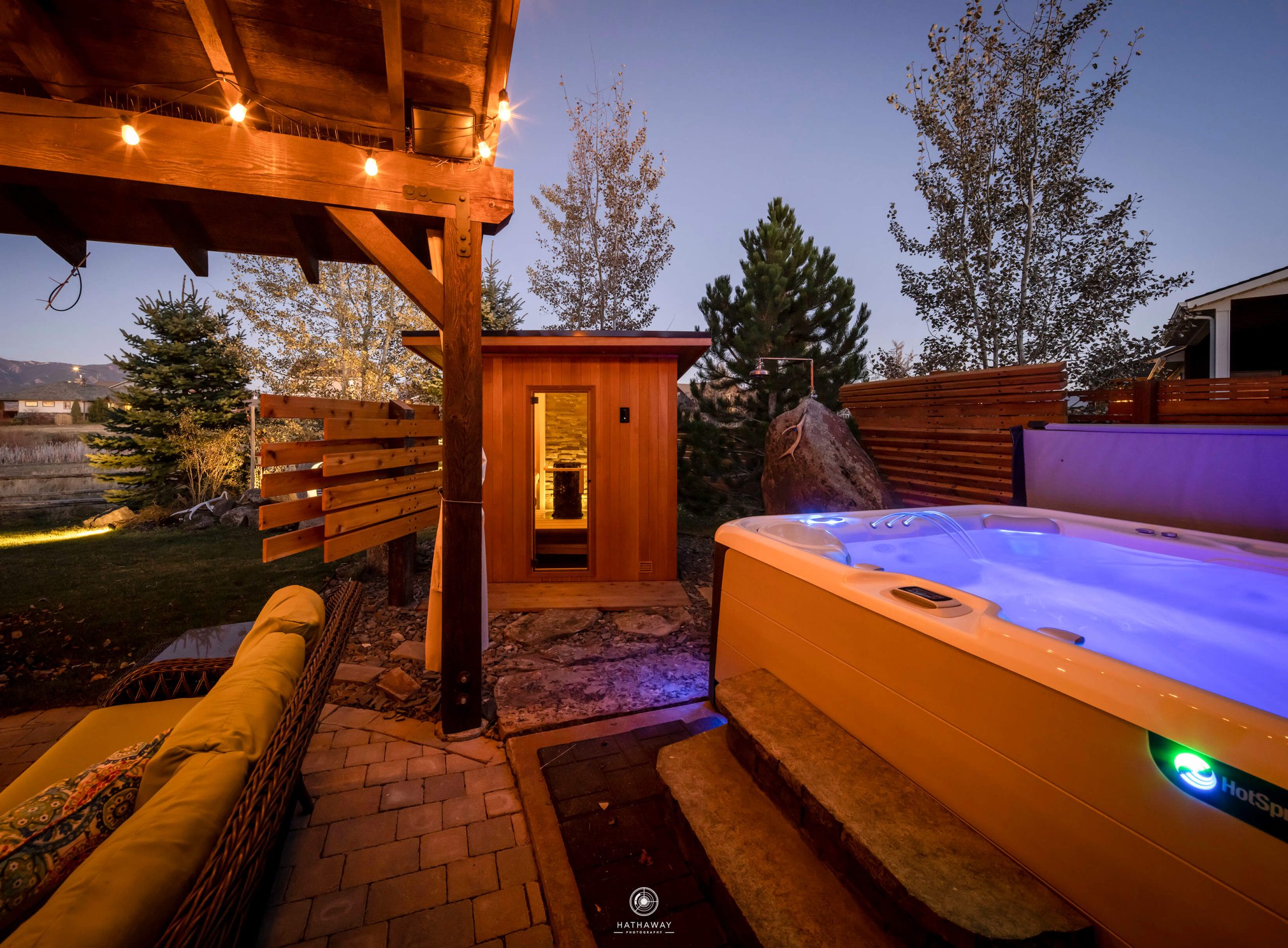 Sauna and swim spa in backyard retreat